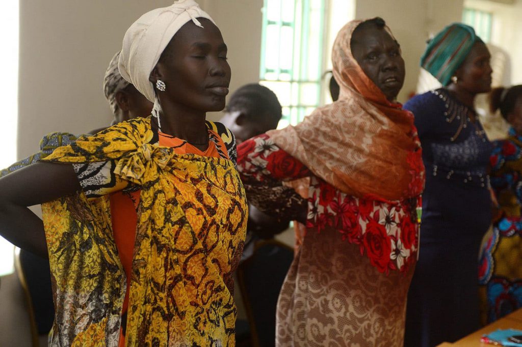 Women in South Sudan practicing Qi Gong