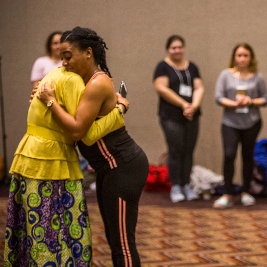 sits for an interview with Ian Witlen at the Coral Springs Museum of Art