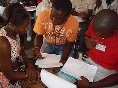 A Haitian participant sharing with the group